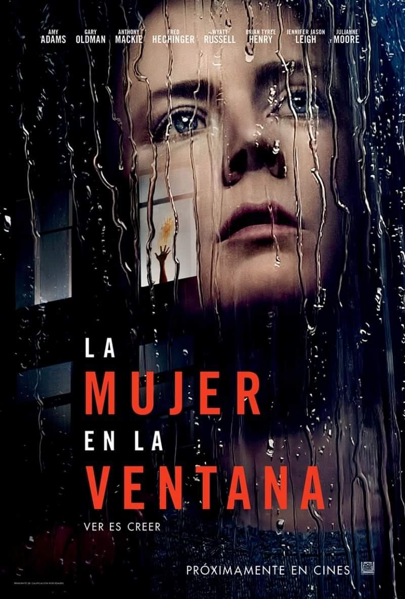 la mujer en la ventana